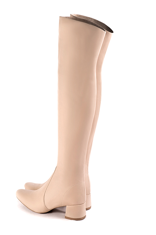 Powder pink women's stretch thigh-high boots. Round toe. Low flare heels. Made to measure. Rear view - Florence KOOIJMAN